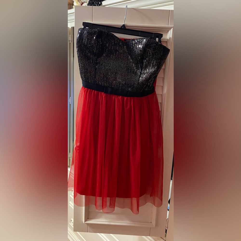 Sparkly black, gold, and red strapless dress